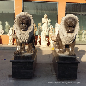 schwarze Marmor Löwenstatuen